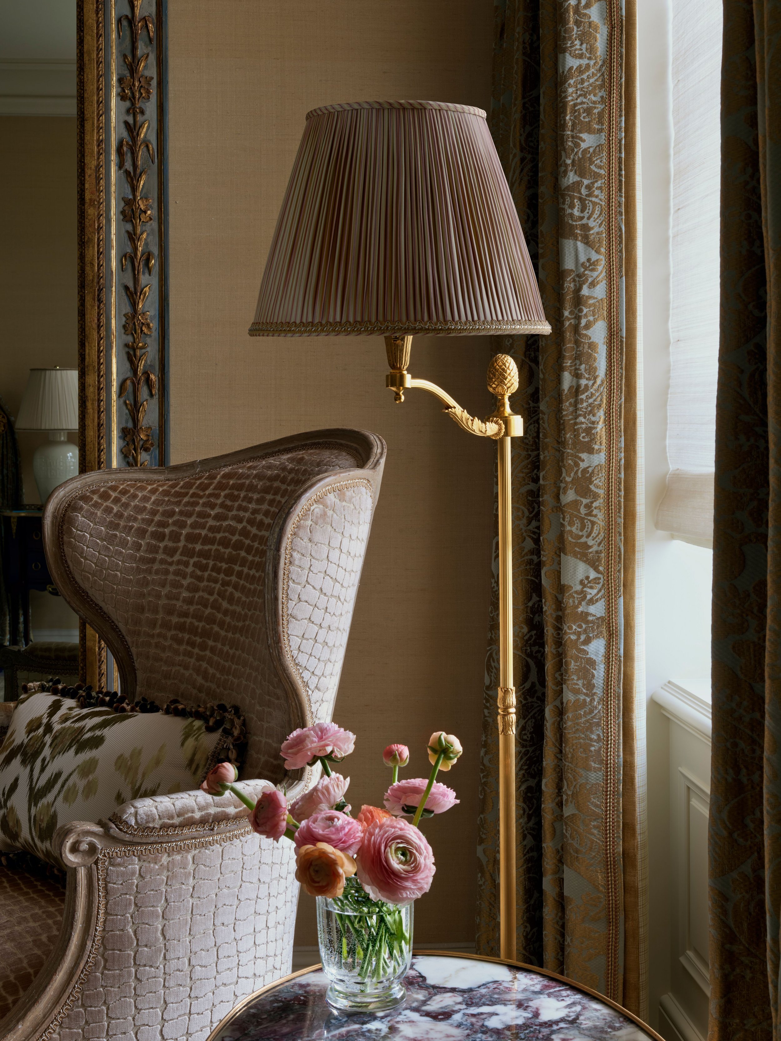 Detail of patterned lampshade, gilt frame, and fresh flowers, Classic French Apartment