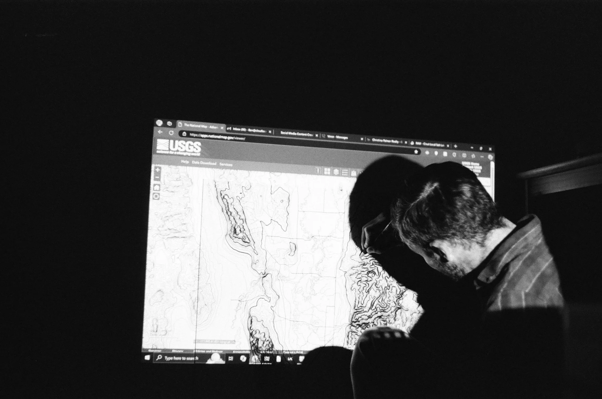 Photo of me drawing the Cache Valley Map. It was my first map and really just an experiment. I had pulled up the USGS National Map projected onto a wall where I taped a piece of poster paper. Then just started following along with pens and markers. 
