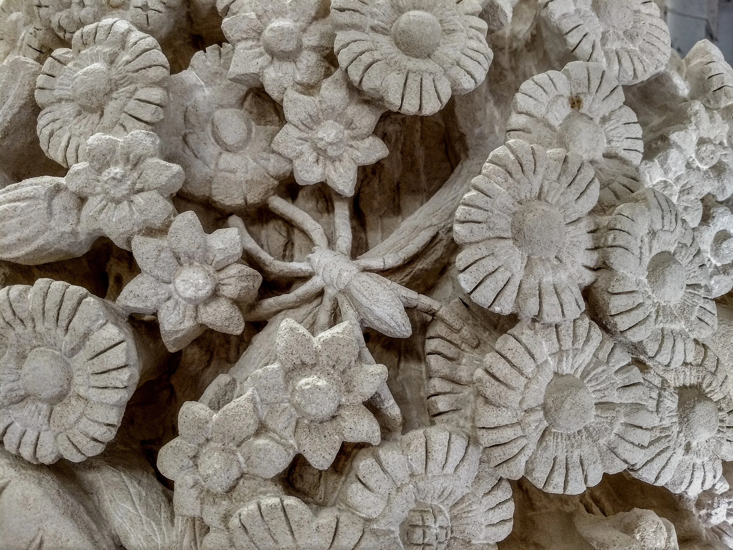 Close-up of a carved stone spider.
