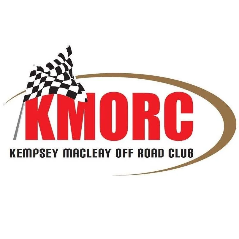 Logo of KEMPSEY MACLEAY OFF ROAD CLUB with red letters KMORC, a checkered flag, and a curved line