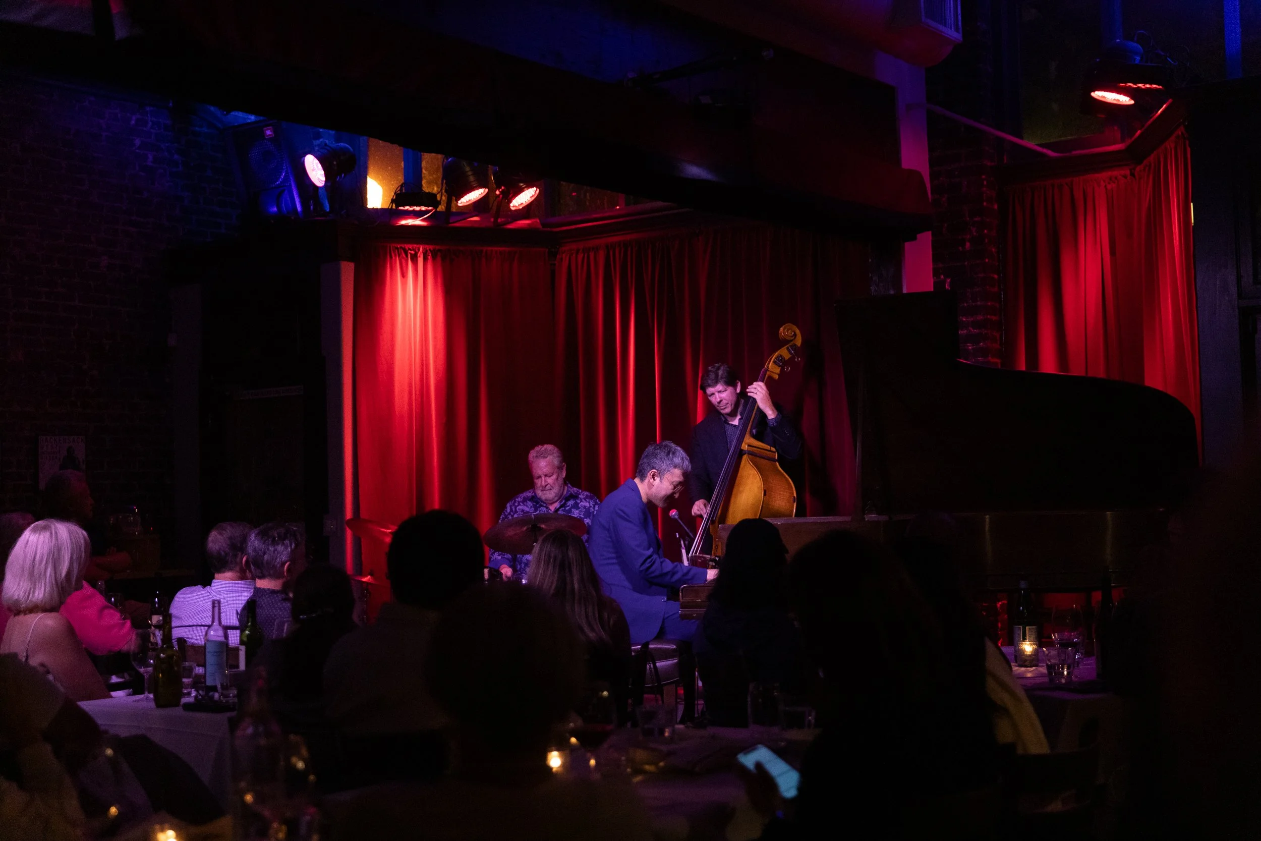 Jazz trio performing for a dinner crowd at Bacchus