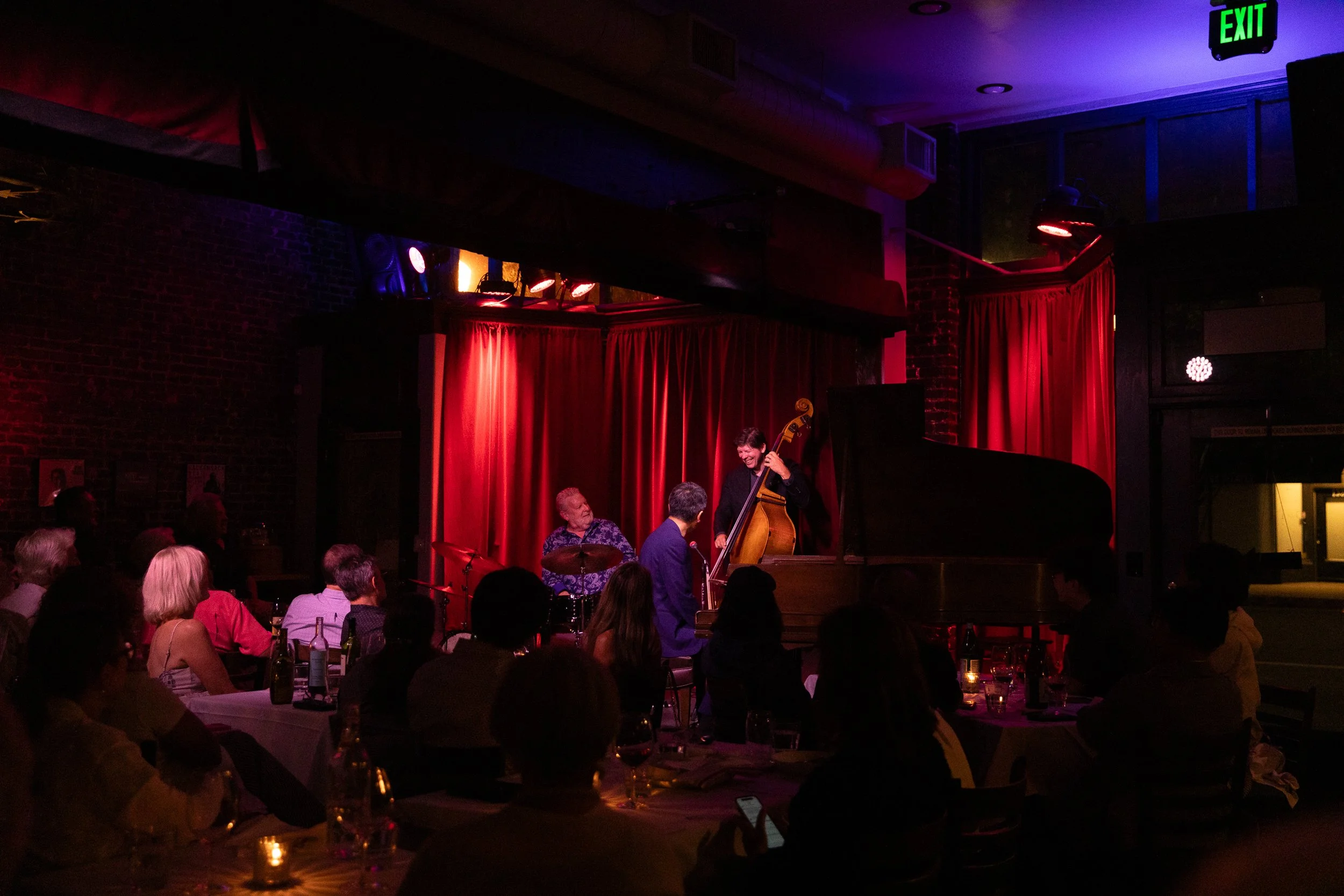Guests enjoying a live jazz set in the Bacchus dining room