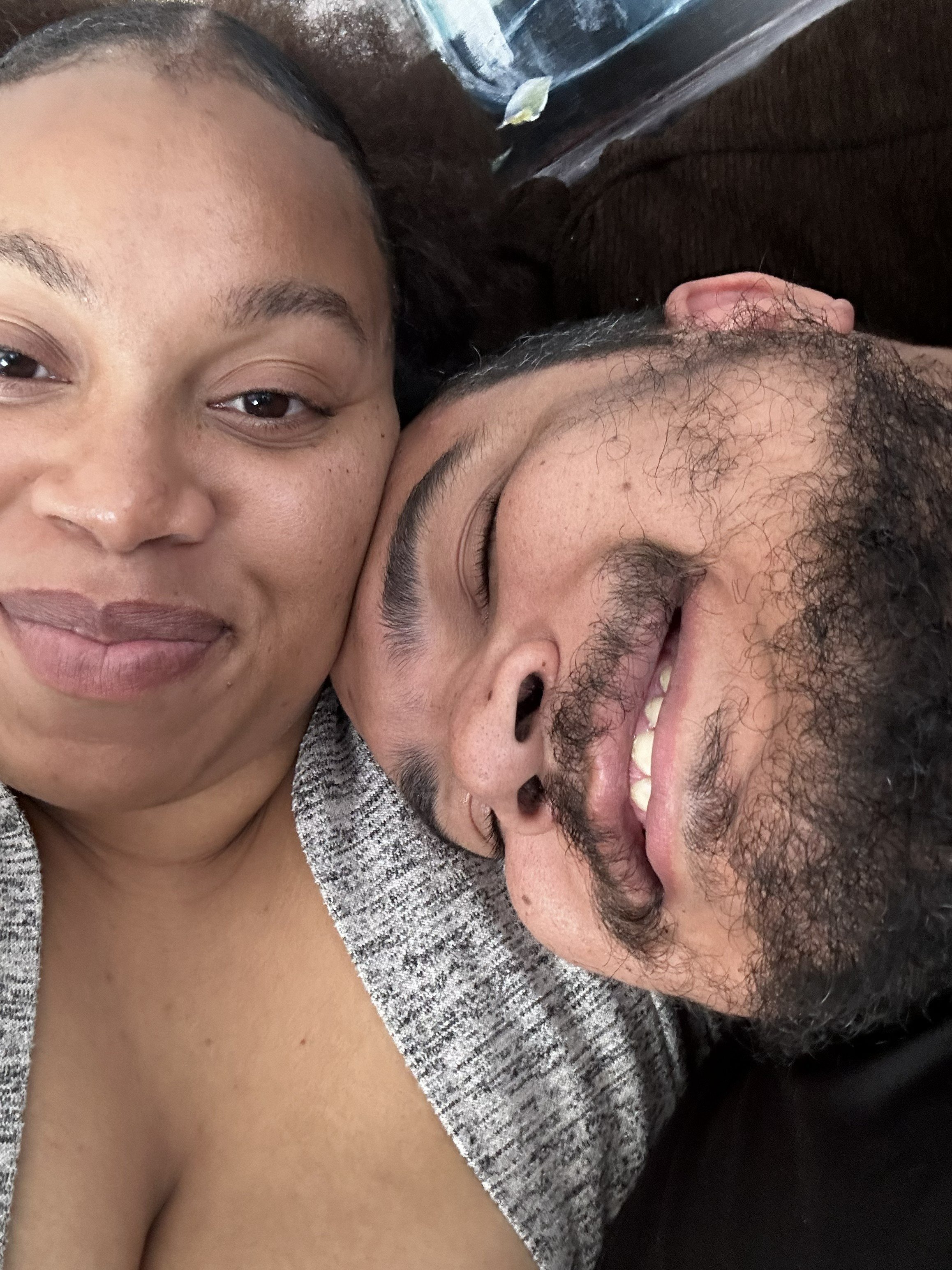 Jazzmin and Sean smiling and resting their heads together