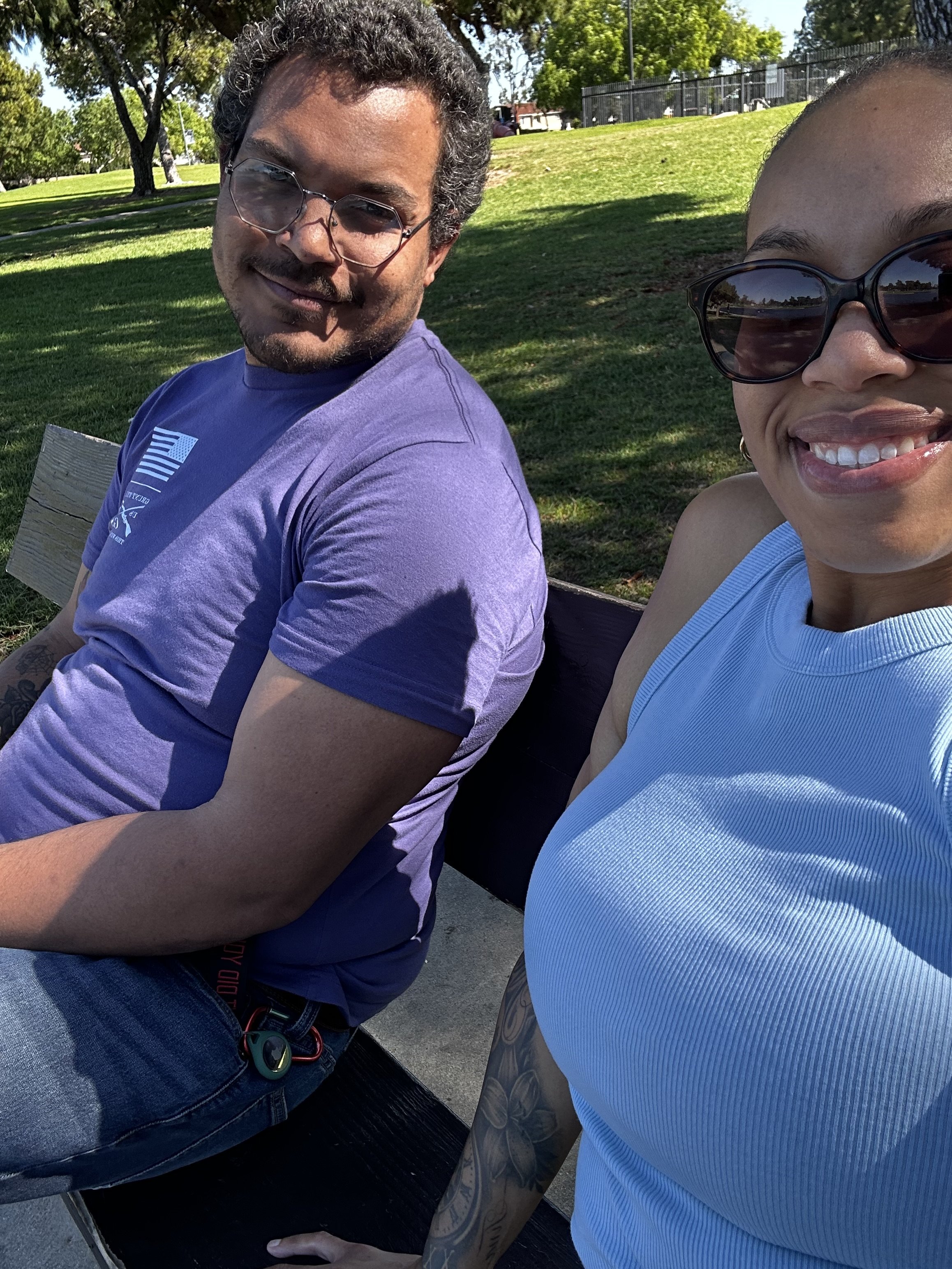 Sean and Jazzmin smiling at the park in long beach california