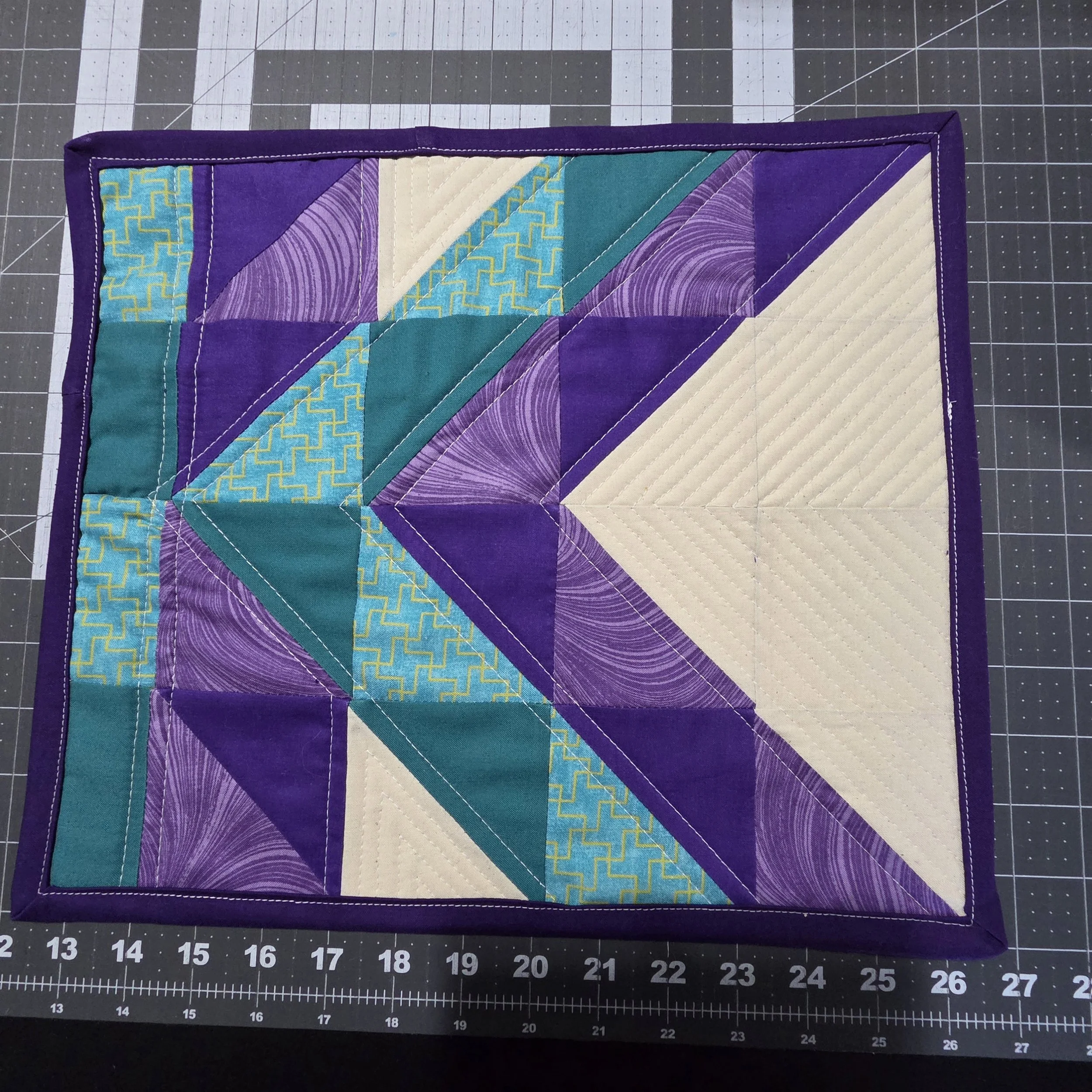 My quilt style logo turned in to an actual mini quilt