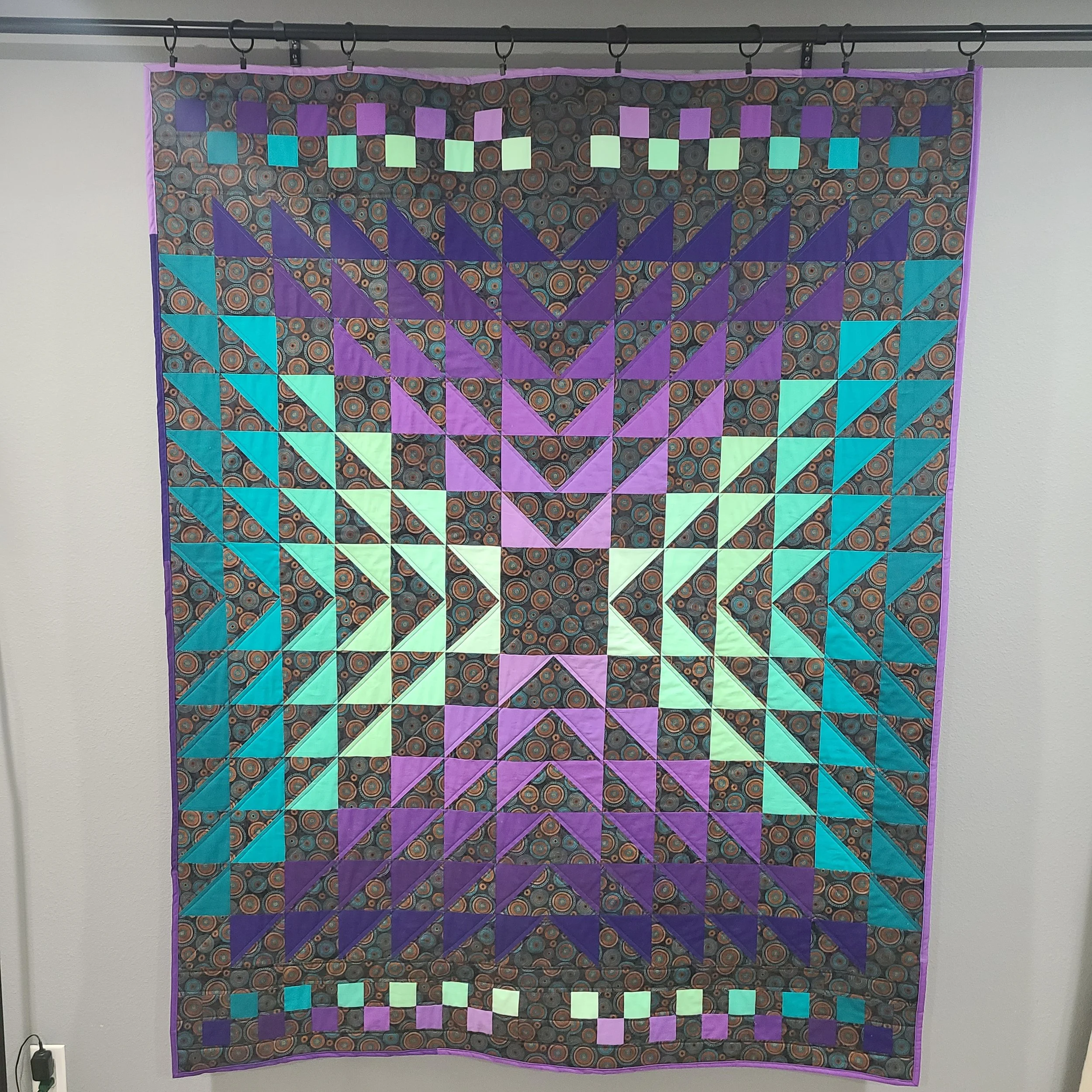 One of my favorites, playing with halt square triangles and gradients