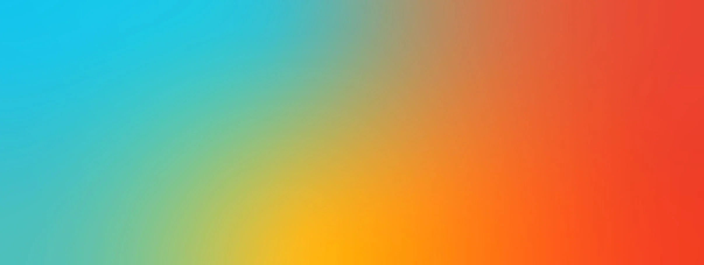 Blurred colorful gradient background, transitioning from blue to green to yellow to orange to red.