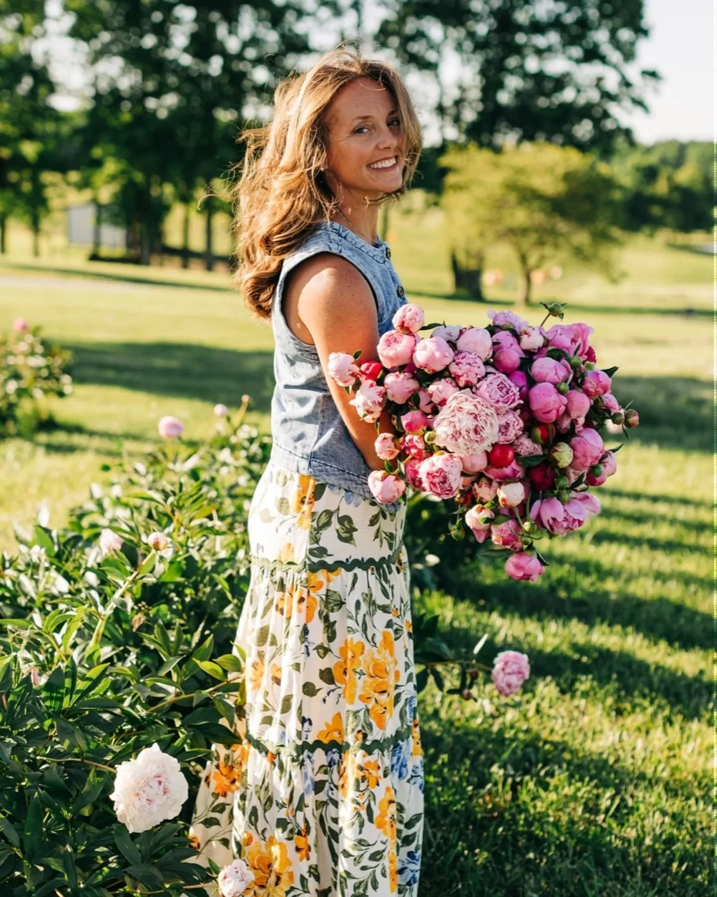 I'm usually the one behind the camera but my girl shot a few photos of me with my peonies. When I planted these peonies 4 years ago, I wasn't even thinking of having photo sessions in them...but last night I had 2 sessions in the peonies and it made 
