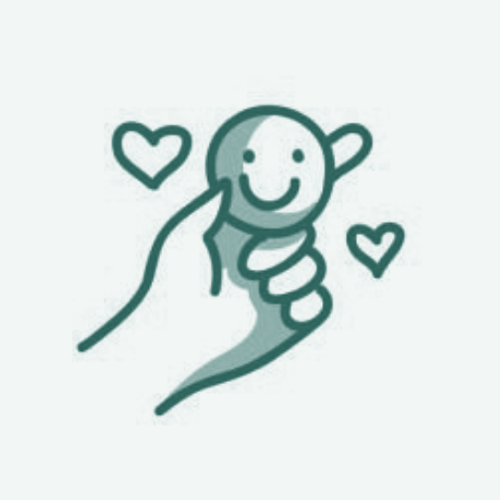 A simple line drawing of a hand holding a capsule with a smiling face and two hearts nearby.