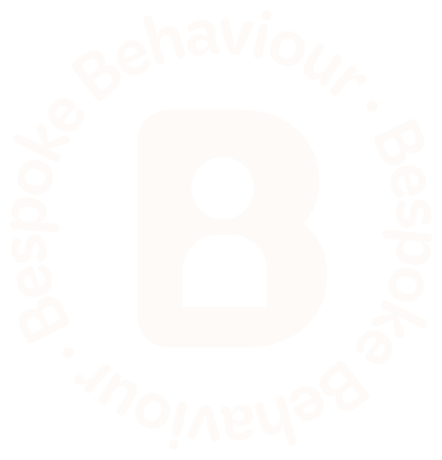 The Bespoke Behaviour logo in white, a solid B with an outline of a person and the business name framing it in a circle.