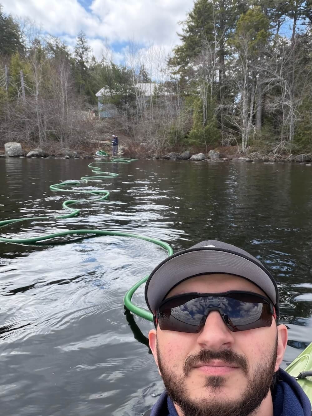 An employee installs the pilot intake system in Ellsworth, ME.