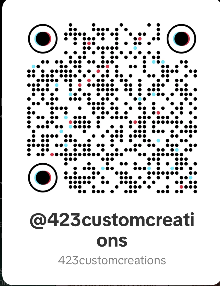 A QR code with stylized eyes located at the top left and right corners and text below reading '@423customcreations' and '423customcreations'.