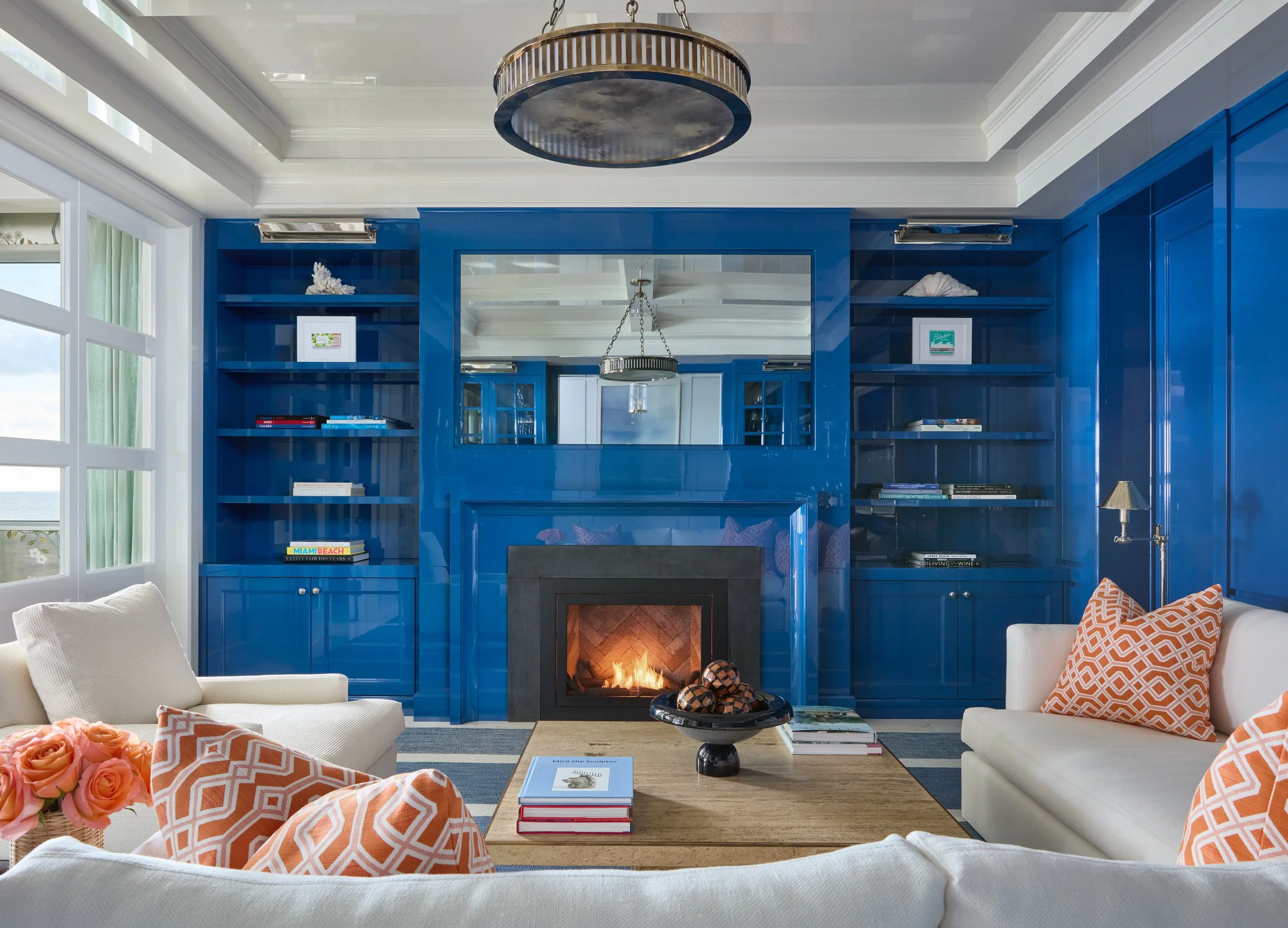 brady-design-gulfstream-penthouse-blue-lacquer-family-room.jpg
