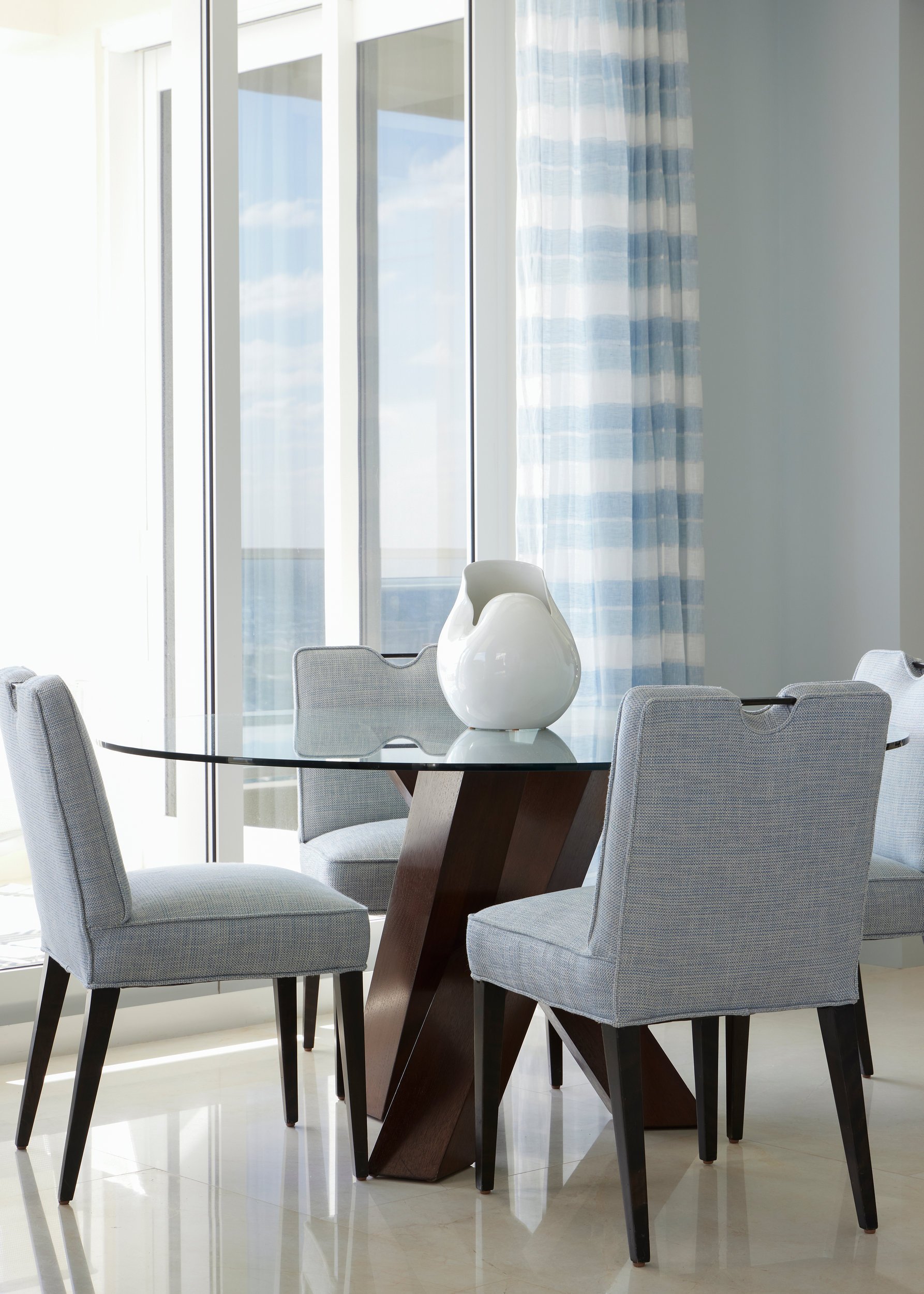 brady-design-gulfstream-penthouse-breakfast-room-glass-table.jpg