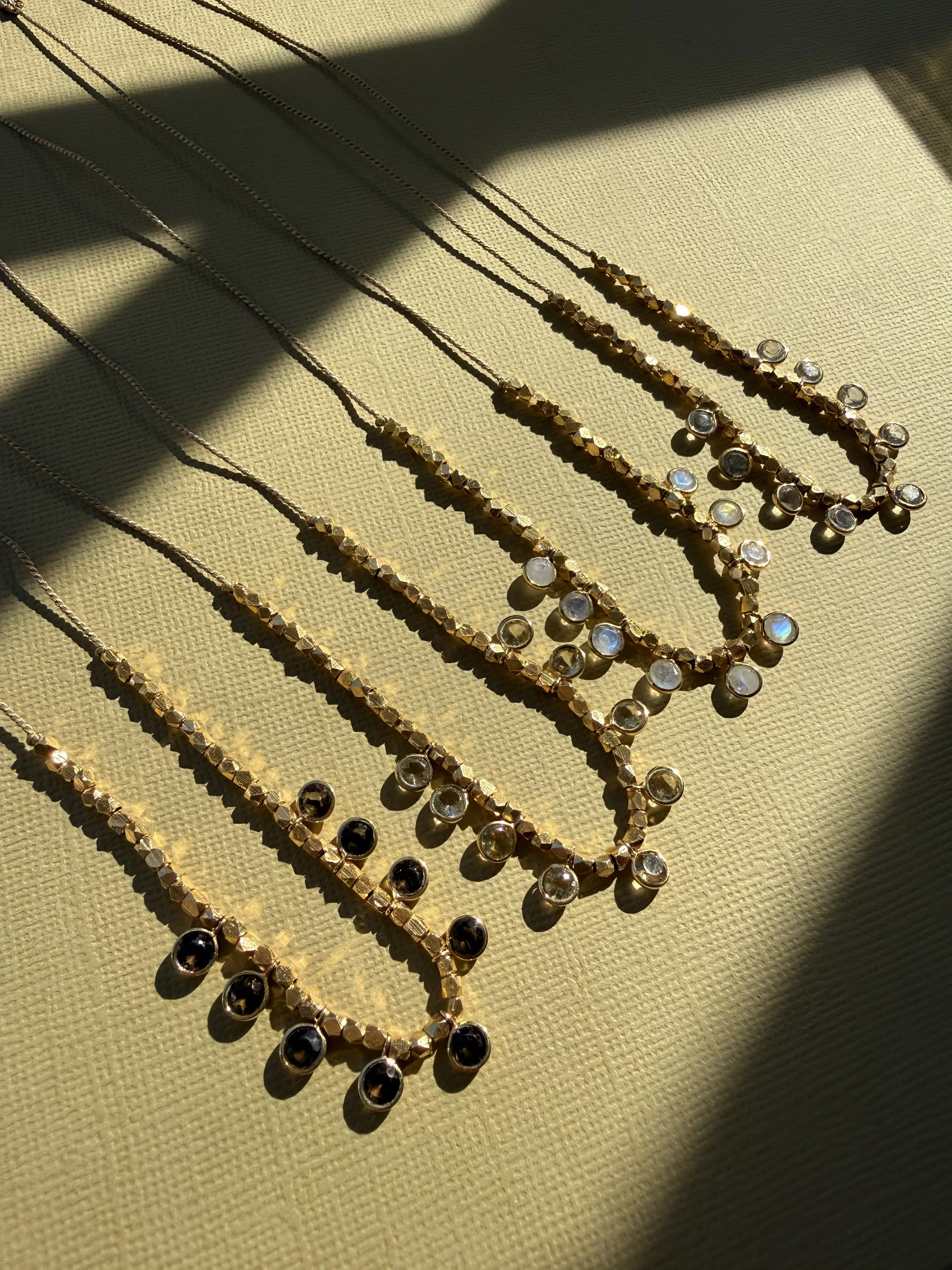 Bouncing Crystals Necklace - Rainbow Moonstone & Smokey Quartz