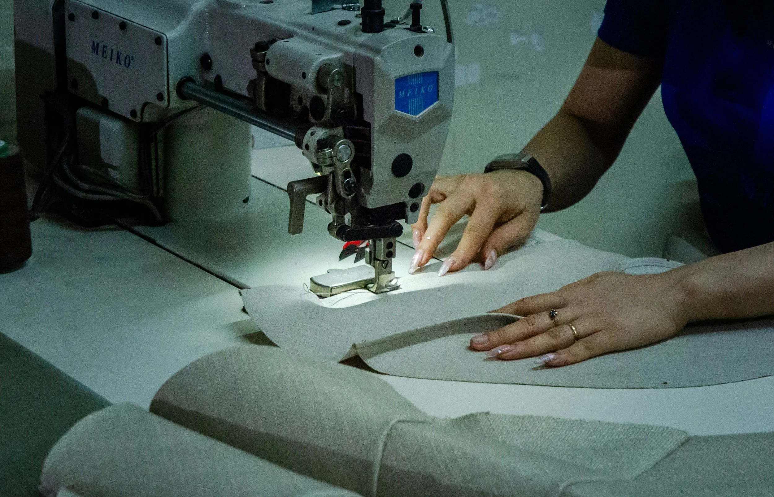 Close-up of an industrial sewing machine representing professional sewing machine servicing.