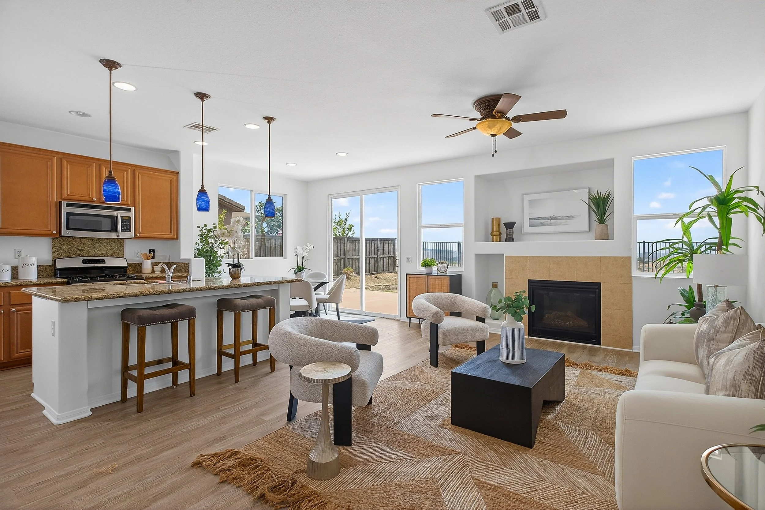 Contemporary kitchen and family room in a Lake Elsinore, California home photographed by Mike Fujie