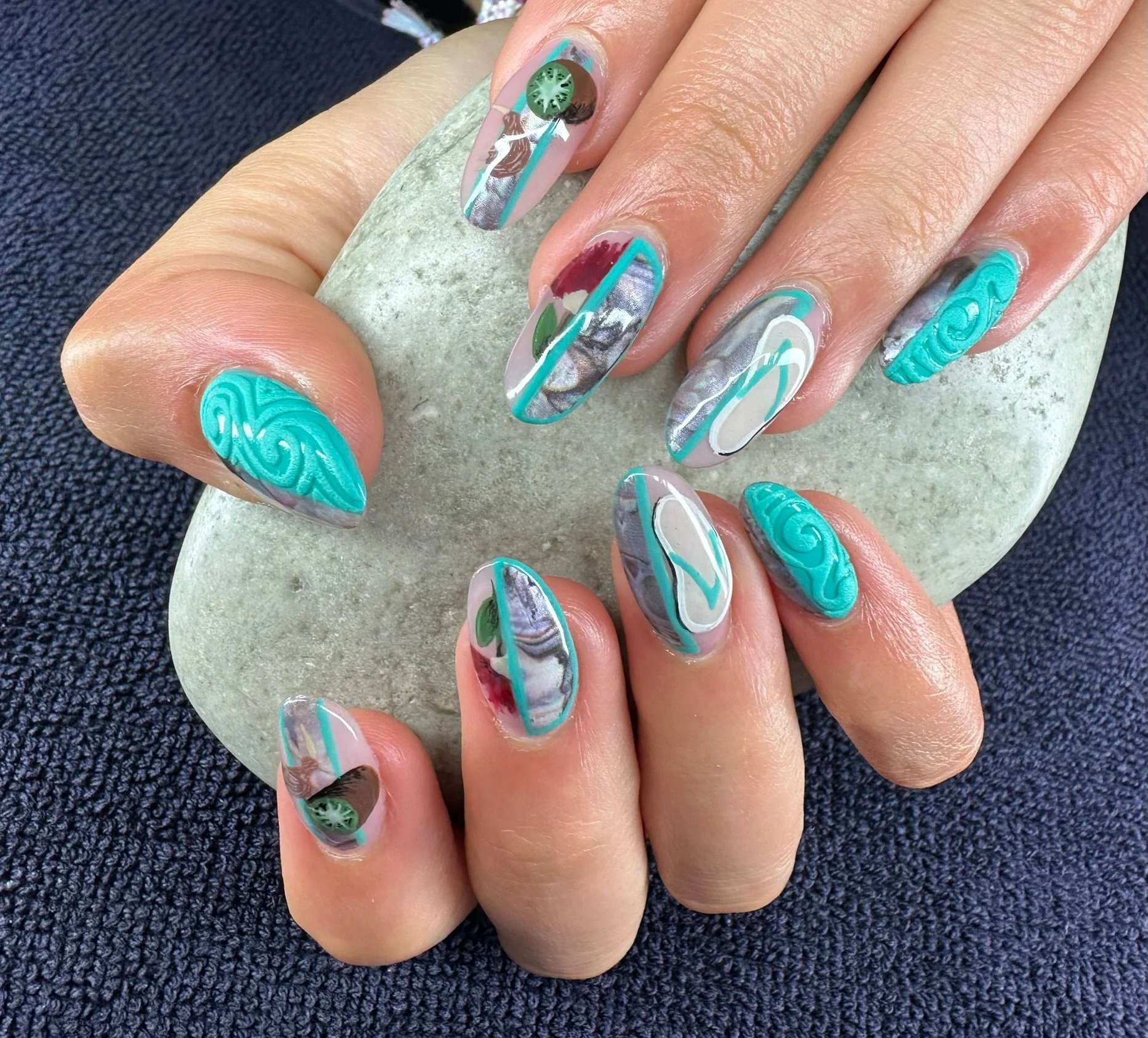 “Teal and pink abstract nail art with flowing hand-painted details on long nails, created by Roses Kustom Worx in Taupō.”