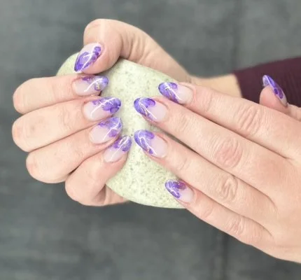 “Purple marble-inspired nail art with soft flowing details, created by Roses Kustom Worx in Taupō.”