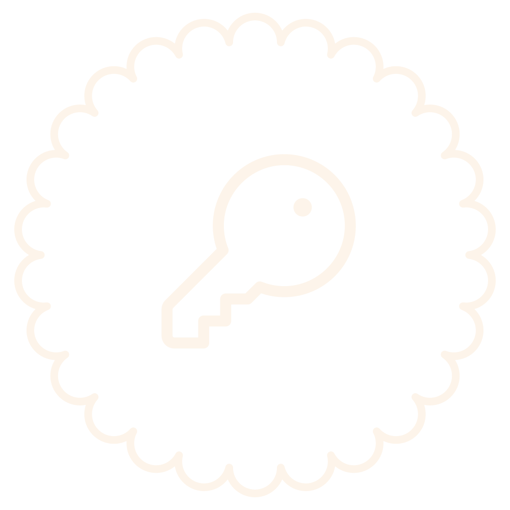 Black background with a white outline of a skull inside a scalloped circular border.