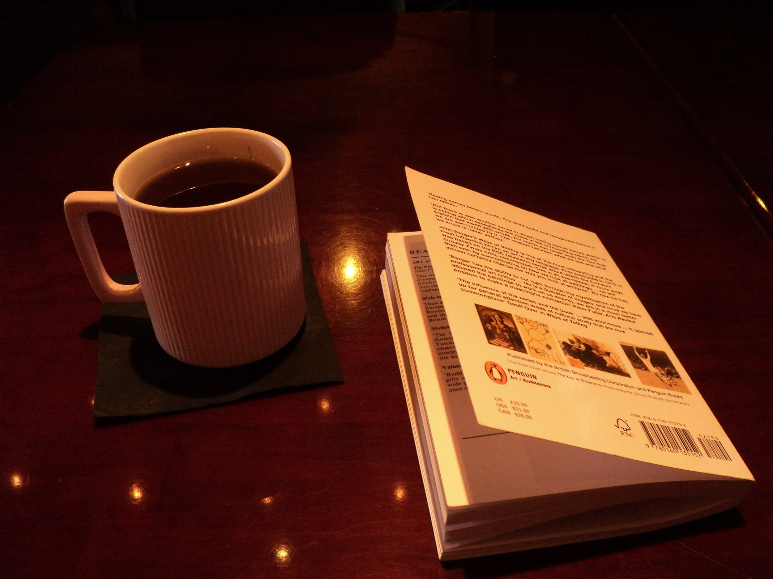 A cup of tea and a book.