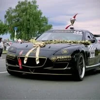 Aims and the Built By Girl car in the 2025 Taupo Xmas Perade