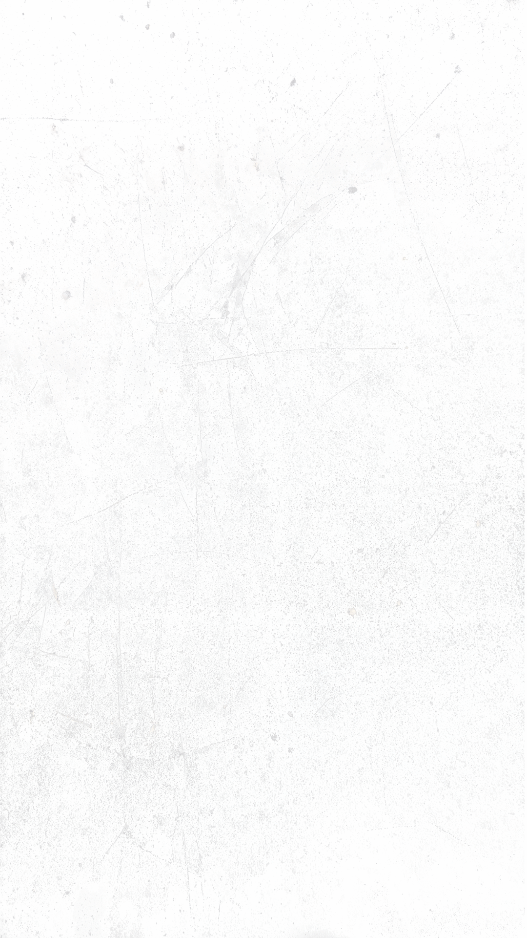 A blank, white, textured wall.
