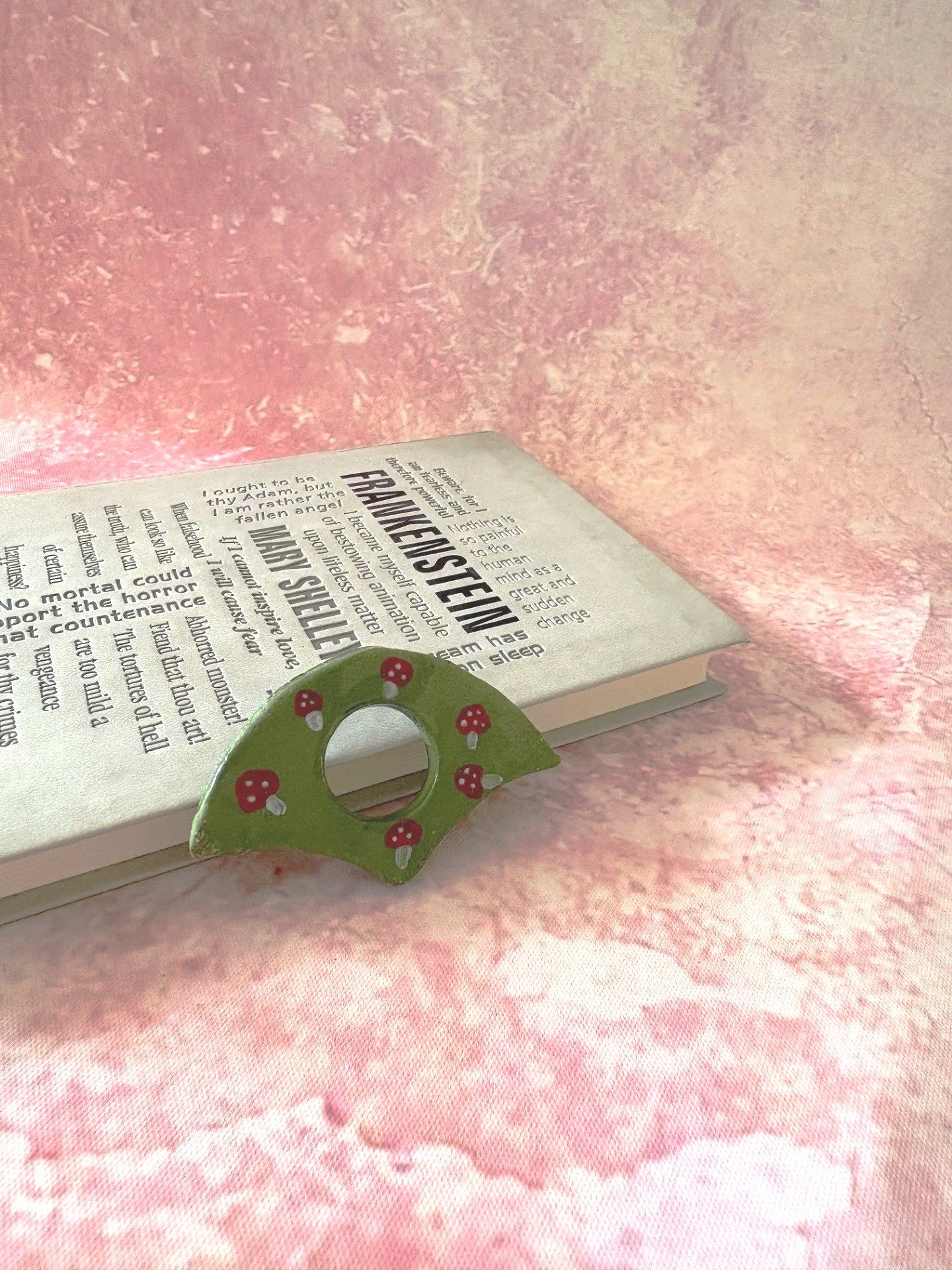 Mushroom pattern, against a green page holder.