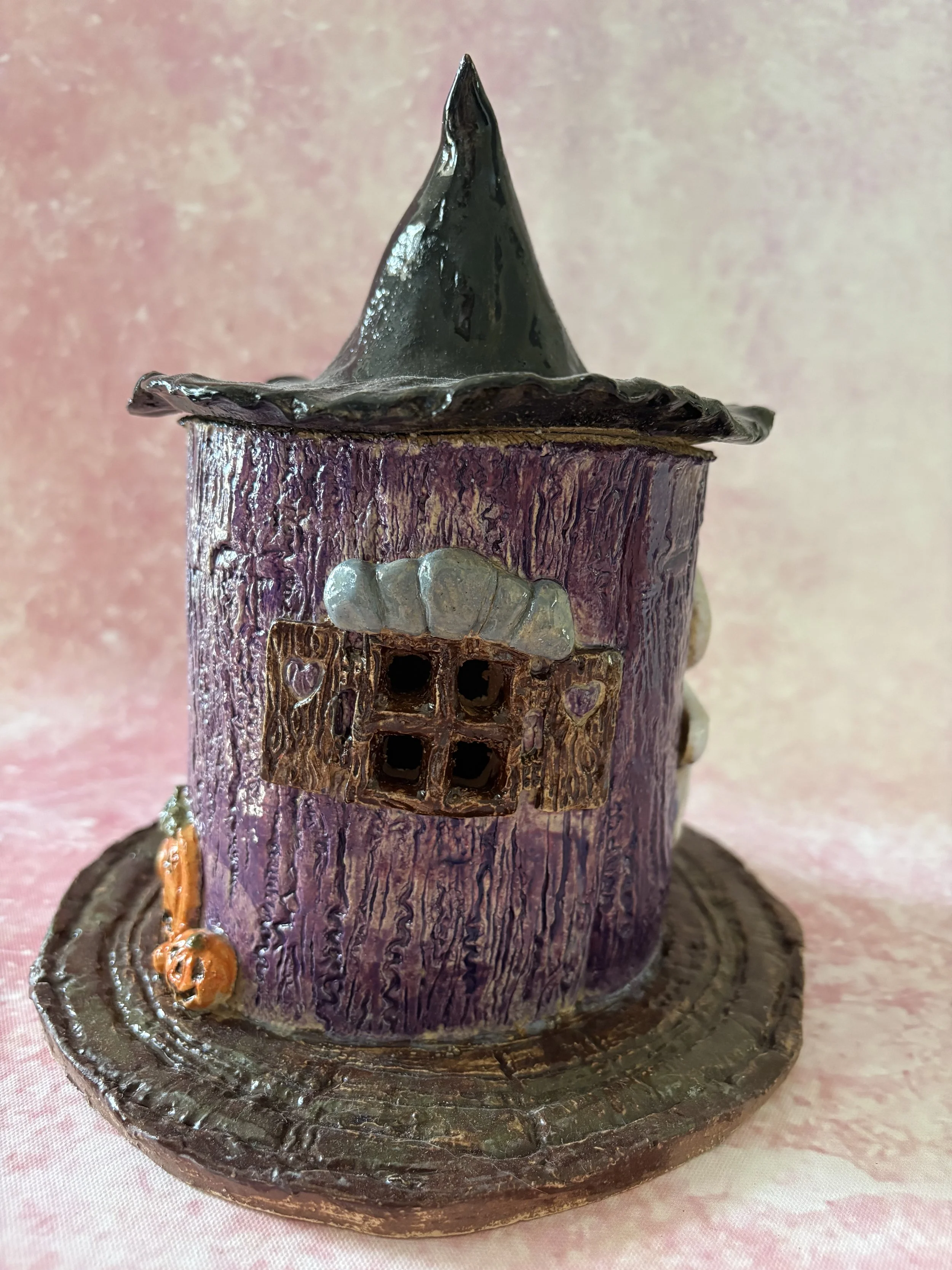 Purple witches cottage back window.