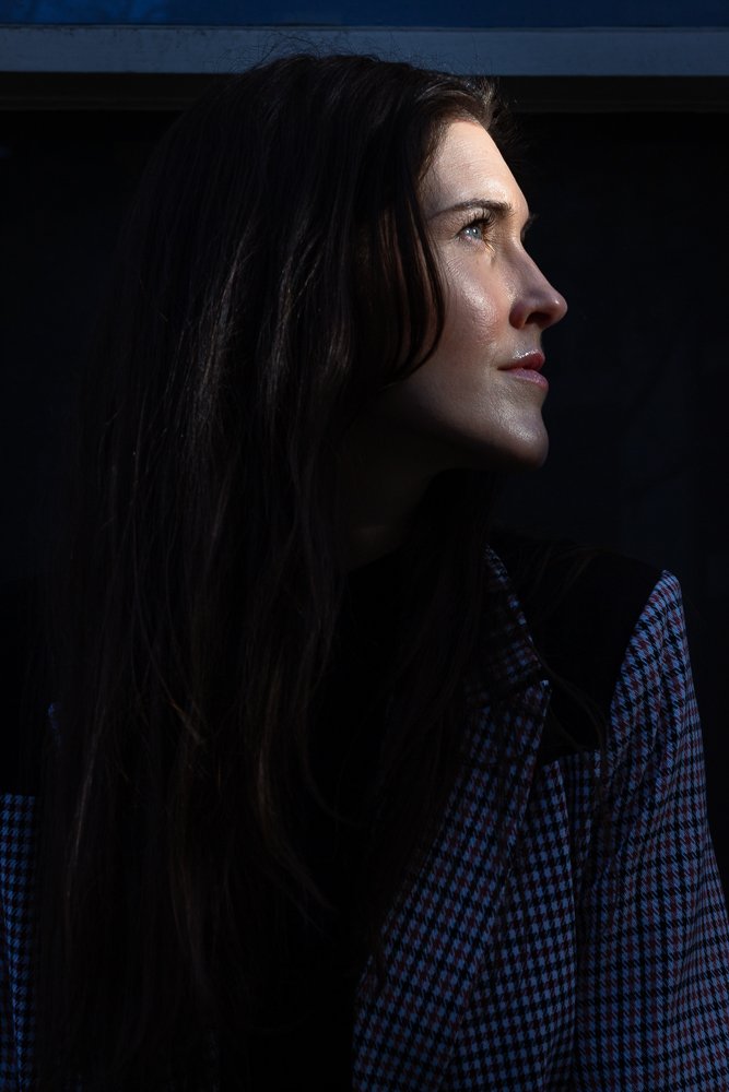 Dramatic shadow portrait full face lit.jpg