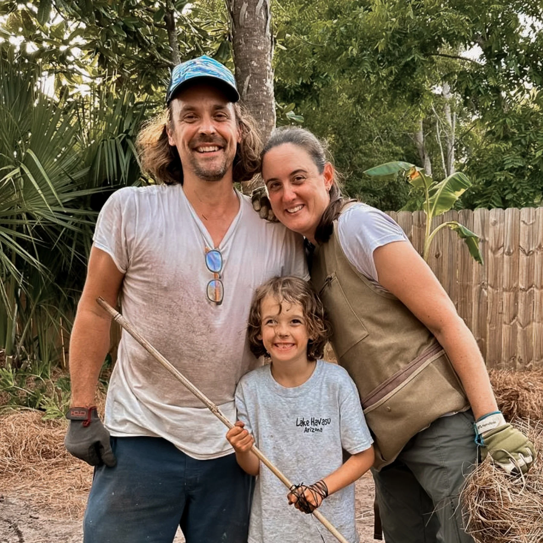 Founders of We Love Land, Sam & Liz Berkheiser with child