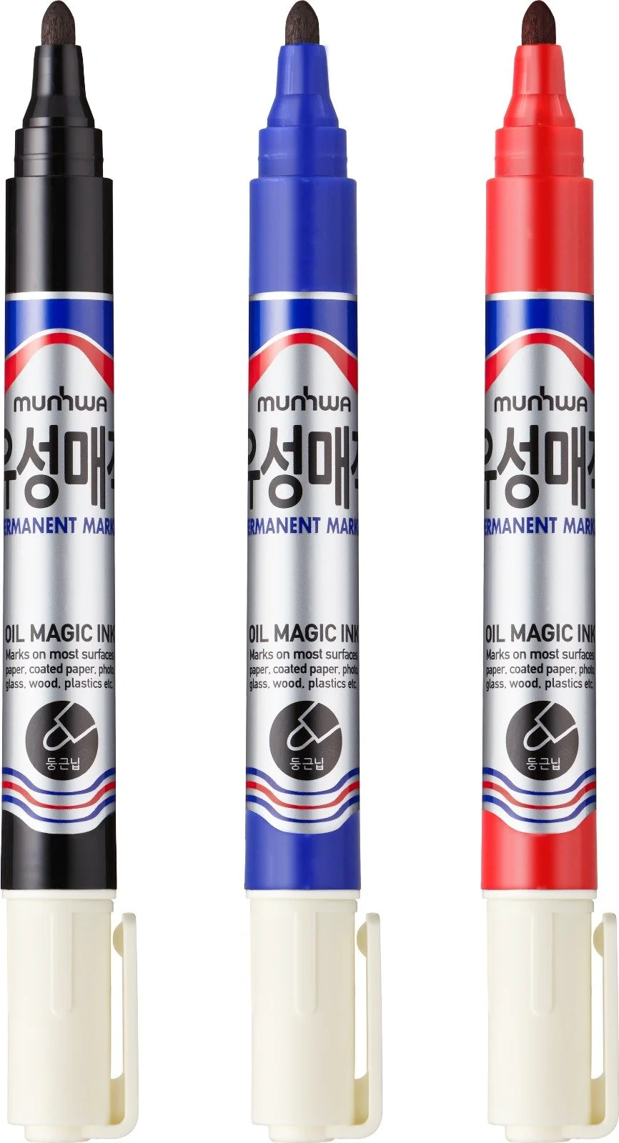 Three permanent markers with black, blue, and red caps.
