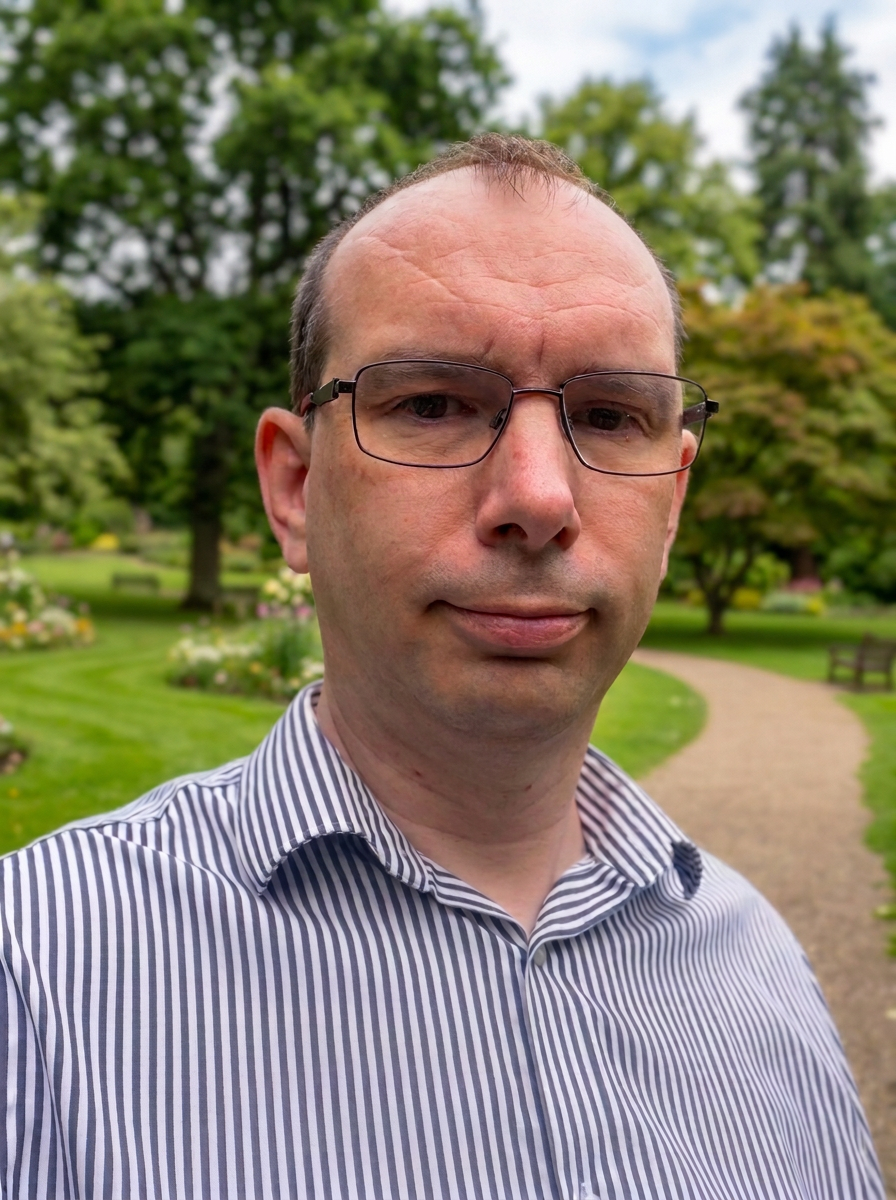 Peter standing in a park