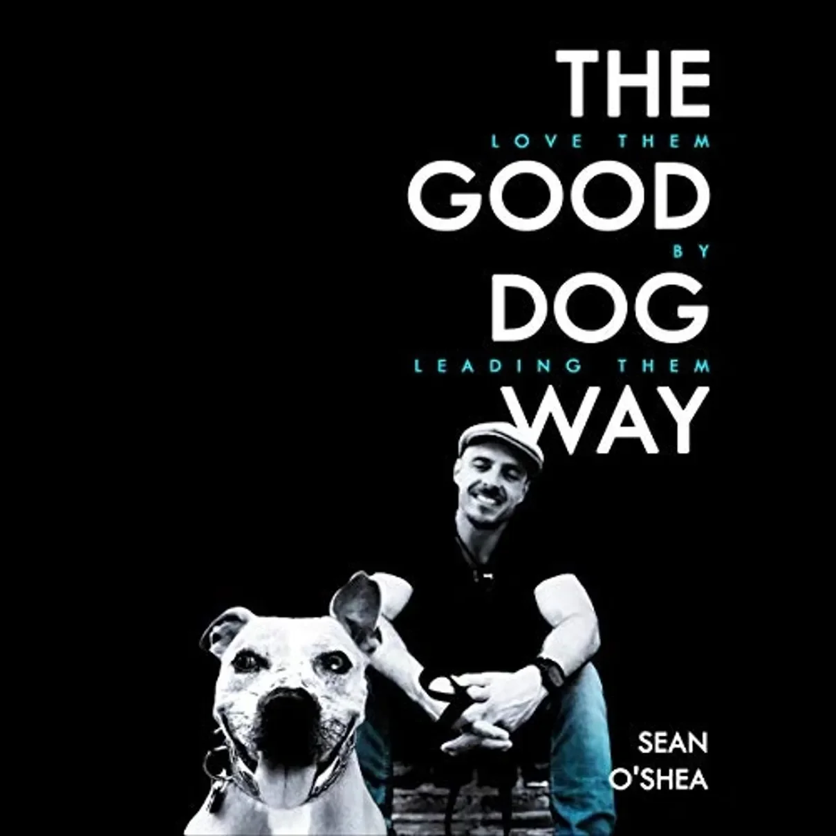 Book cover titled "The Love Them Good Dog By Leading Them Way" by Sean O'Shea featuring a black background, a smiling man wearing a hat and a dog in the foreground.