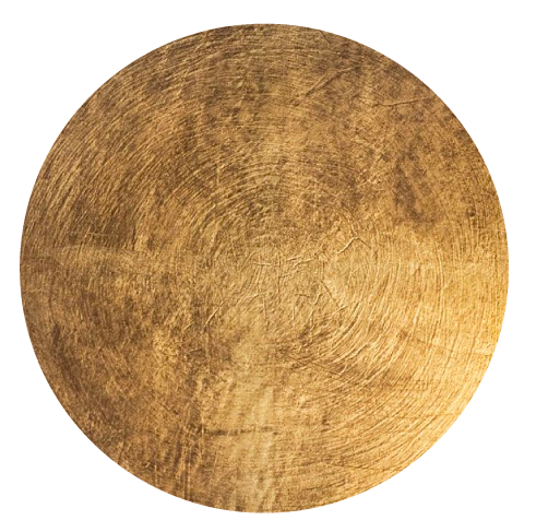 Vista de una superficie de madera redonda, mostrando detalles de la textura y los anillos de crecimiento.