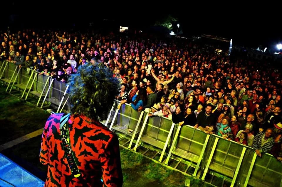 Dan Angelow on stage with Dr and the Medics