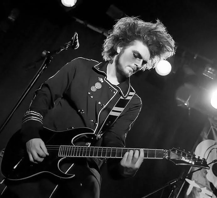 Dan Angelow on stage with Dr and the Medics