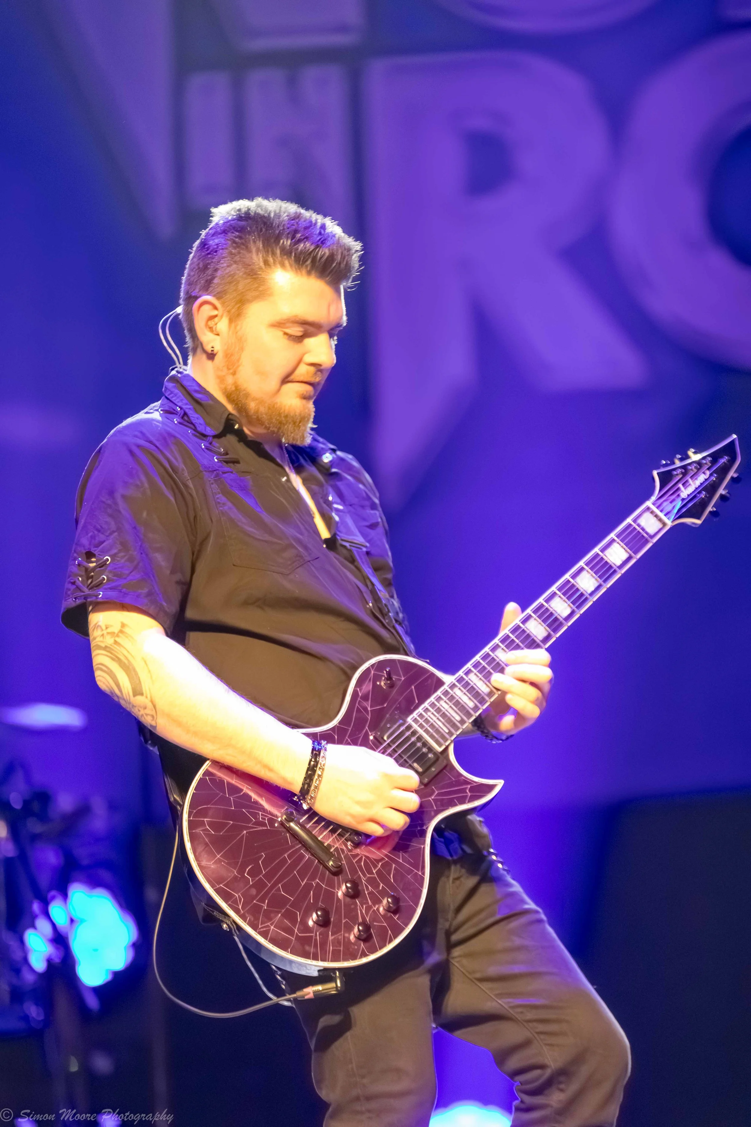 Dan Angelow on stage with Women In Rock