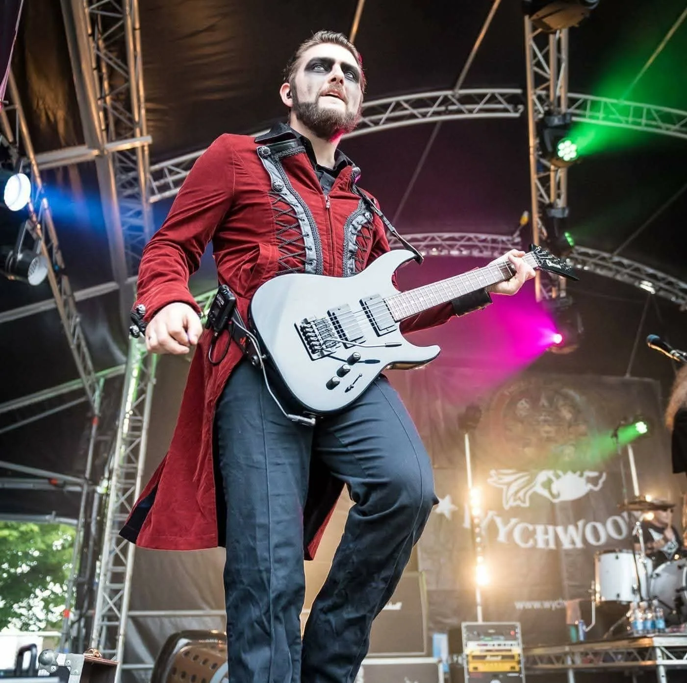 Dan Angelow on stage with Dr and the Medics