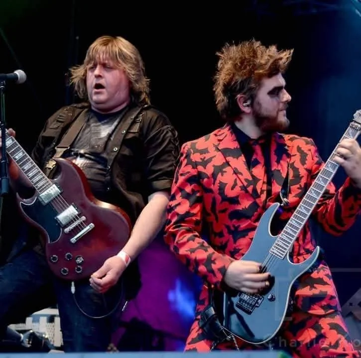 Dan Angelow on stage with Dr and the Medics playing along side his Father Chris.