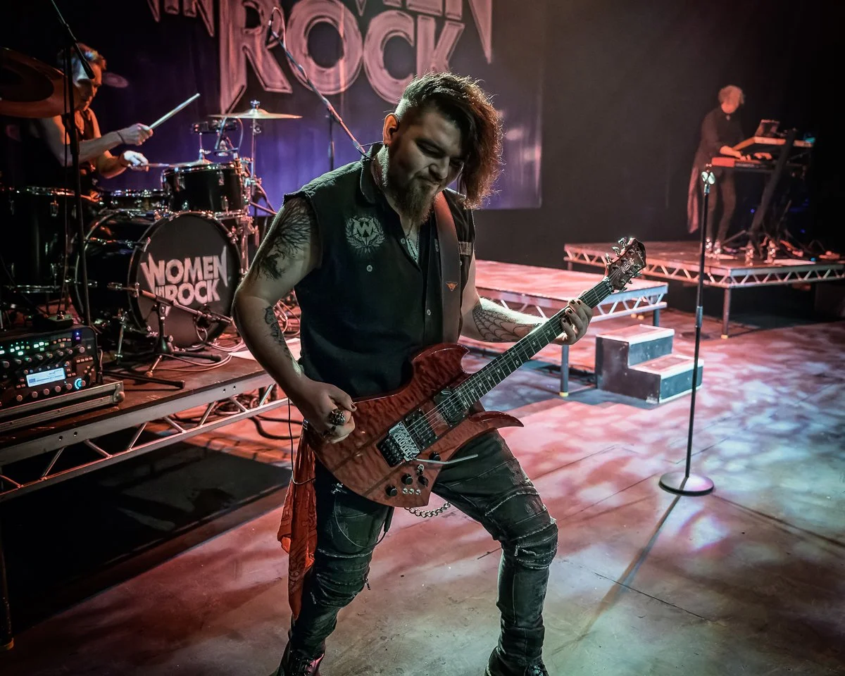 Dan Angelow on stage with Women In Rock