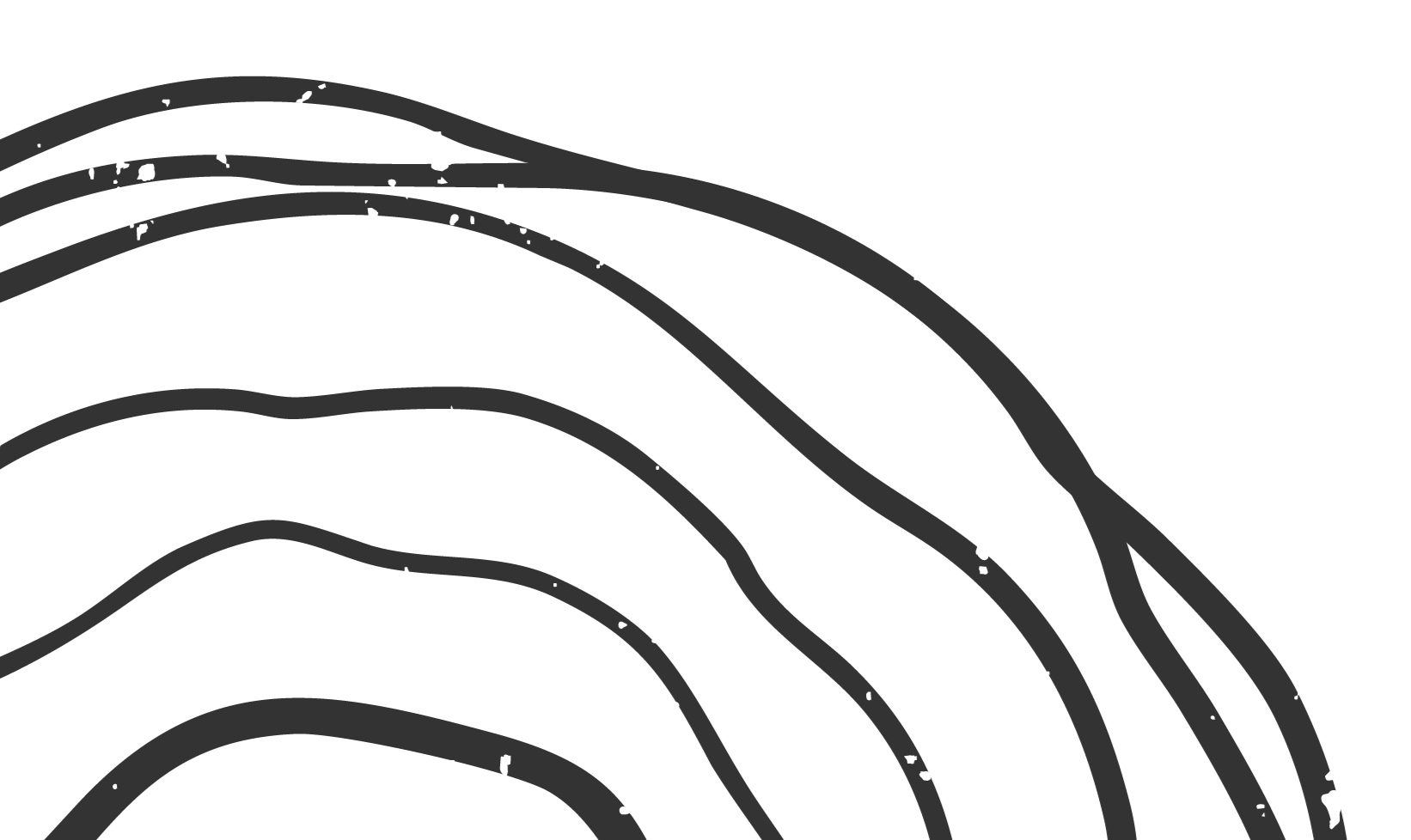 Close-up of black and gray rubber tracks with white specks, likely from a vehicle or machinery, on a black background.