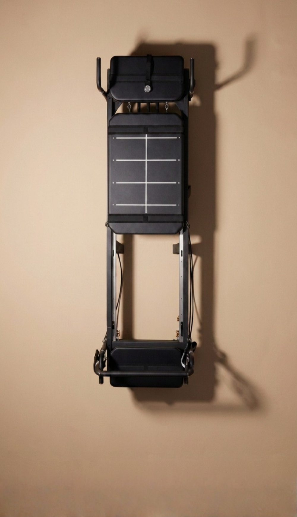 A black Tensionformer machine from above.
