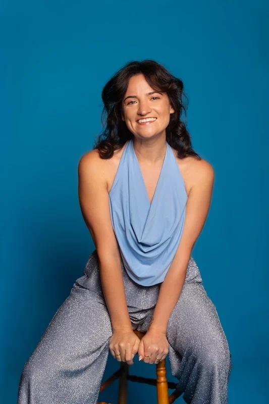 A photo of Kelsey Faye in sparkly blue pants
