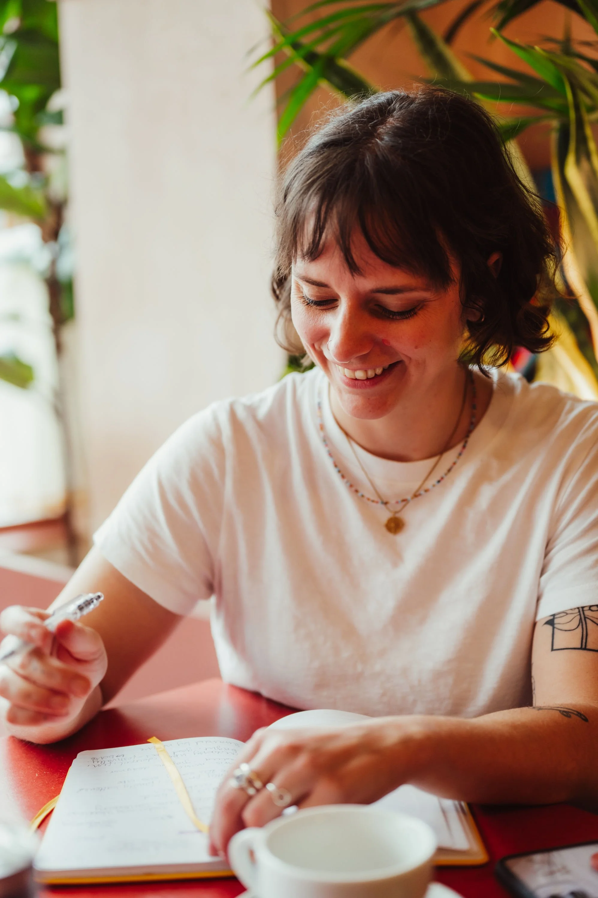 - [ ] Hannah is writing in a yellow notebook