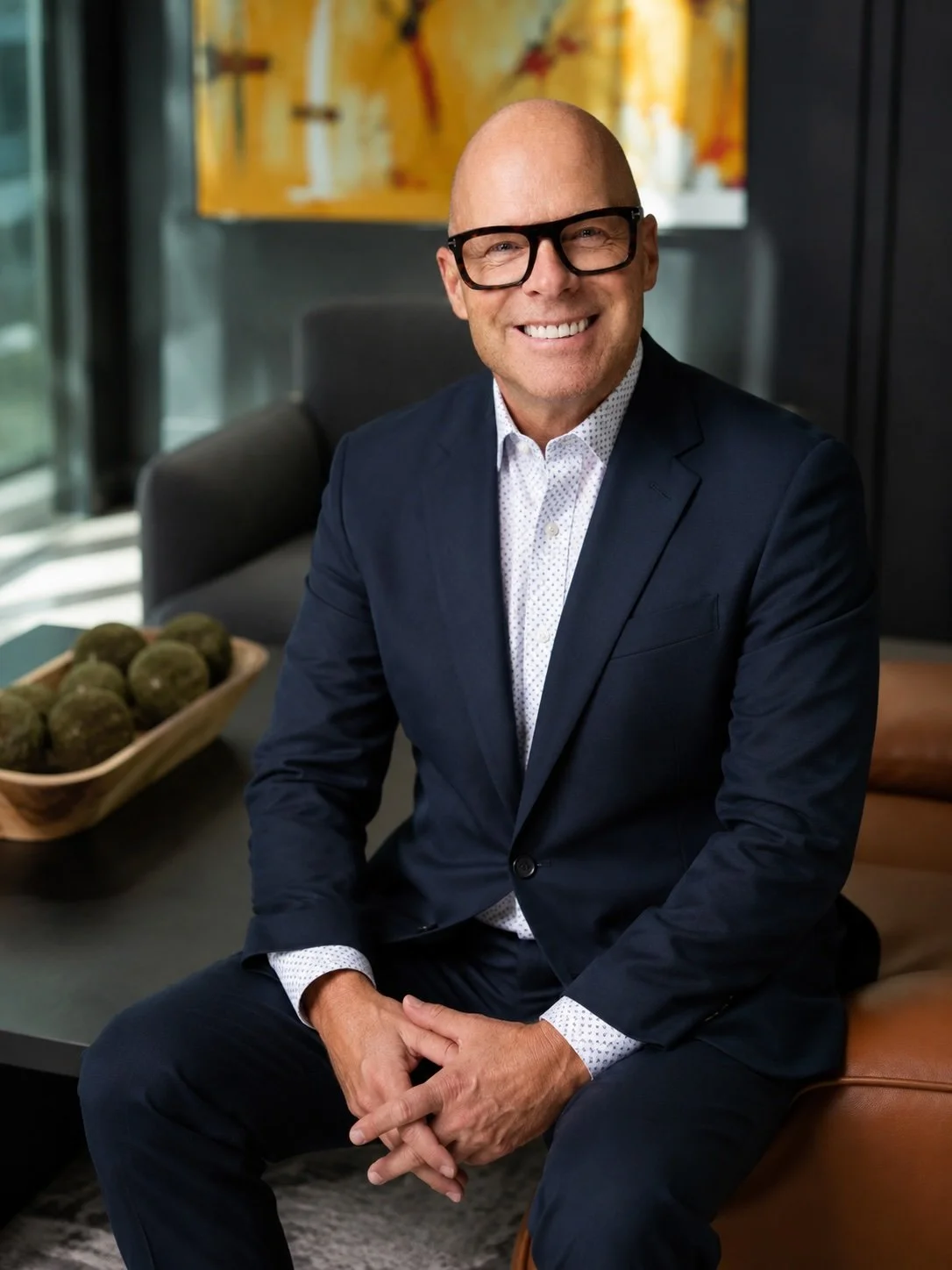david ott headshot smiling in white shirt with dark suit