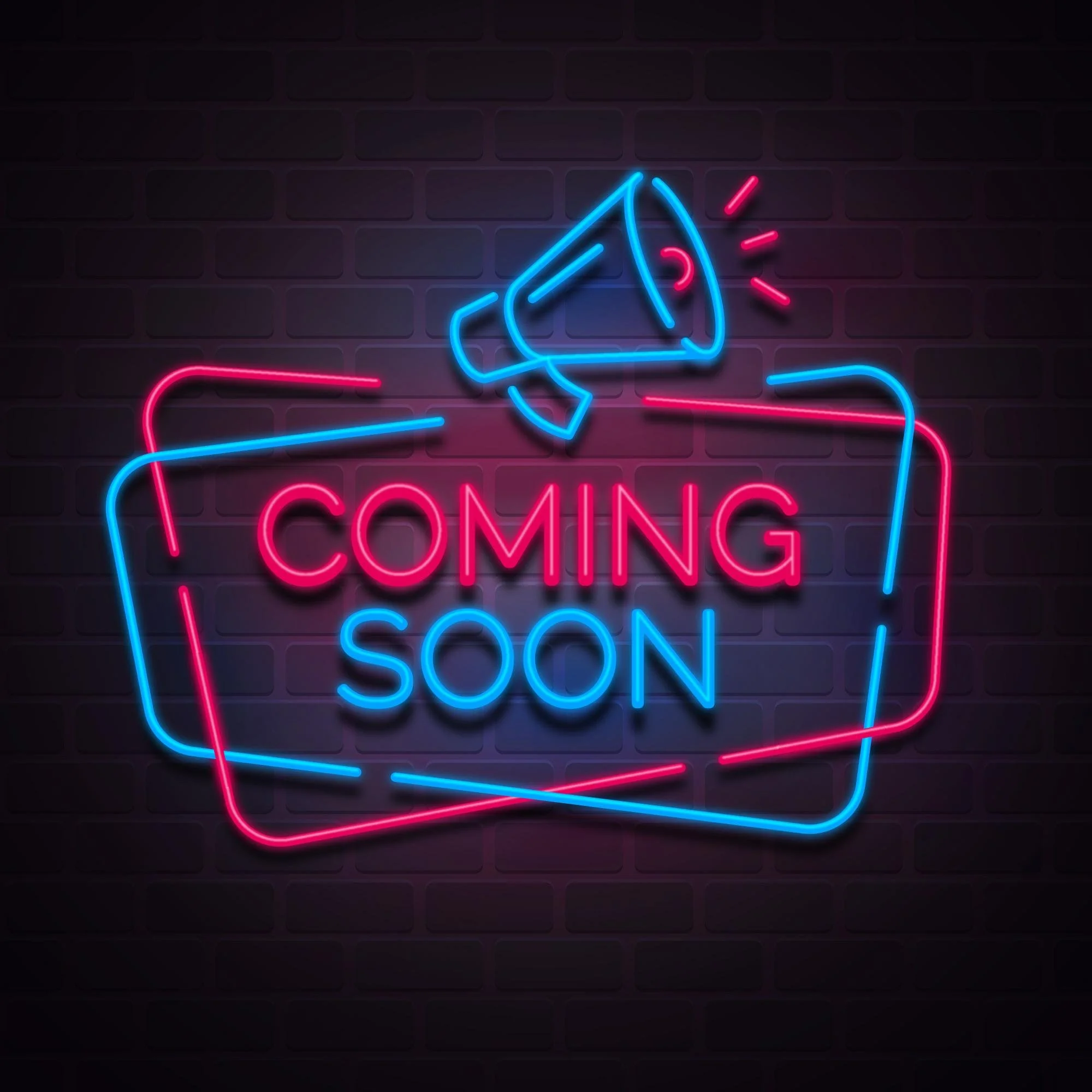 Neon sign with the words 'Coming Soon' in pink and blue, shaped like a megaphone and speech bubble, against a brick wall.