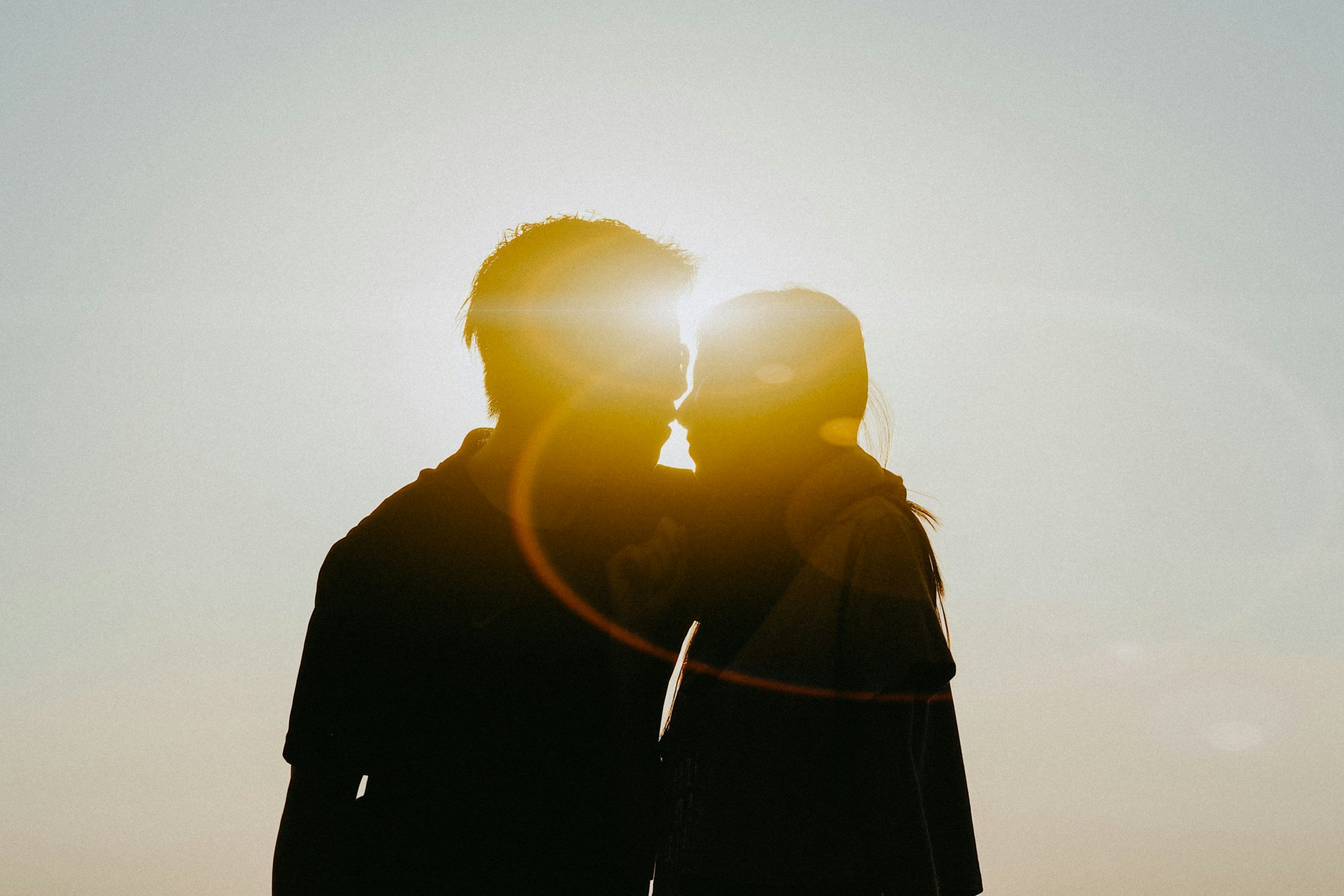 Happy couples with sunset