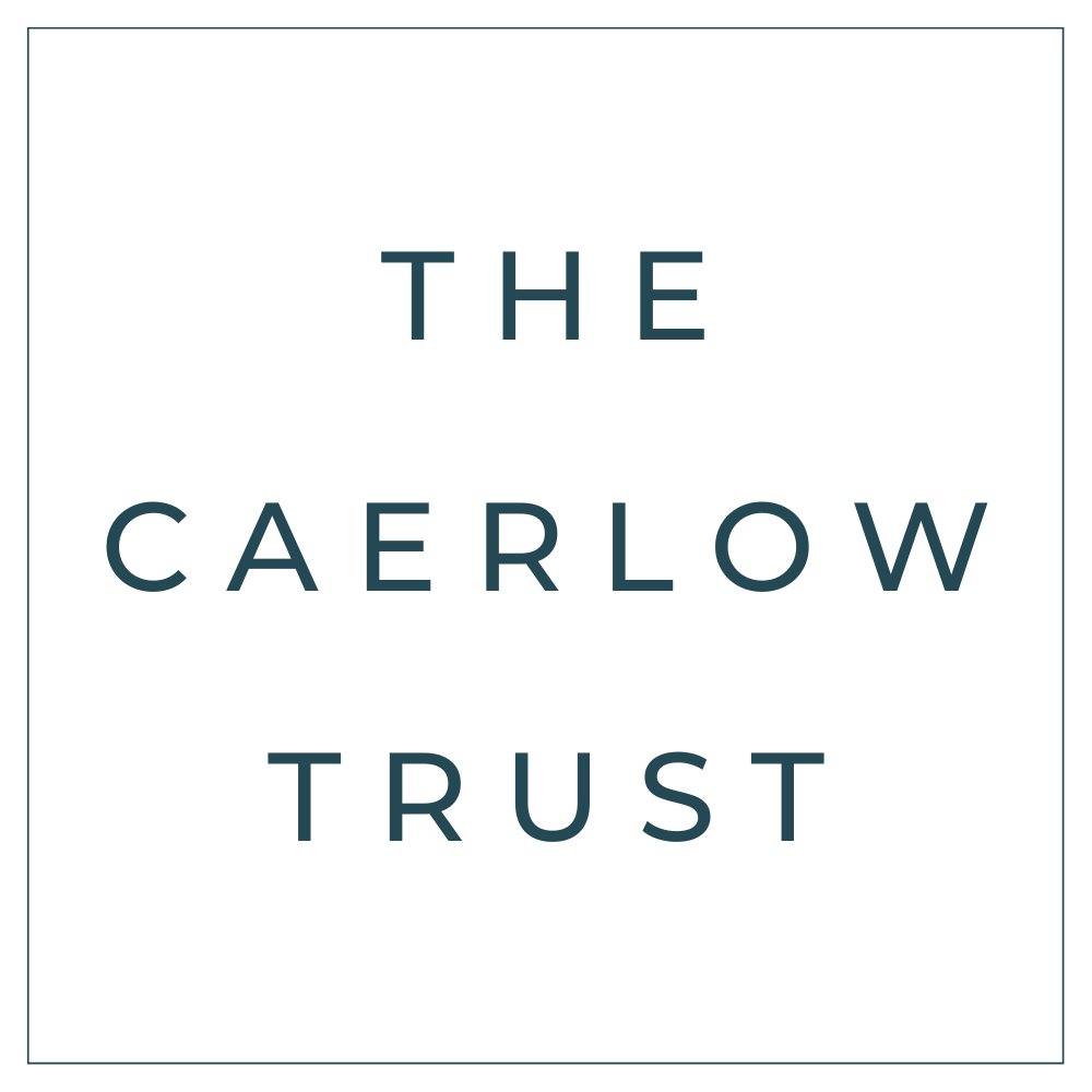 The Caerlow Trust logo with the name displayed in blue text on a black background.
