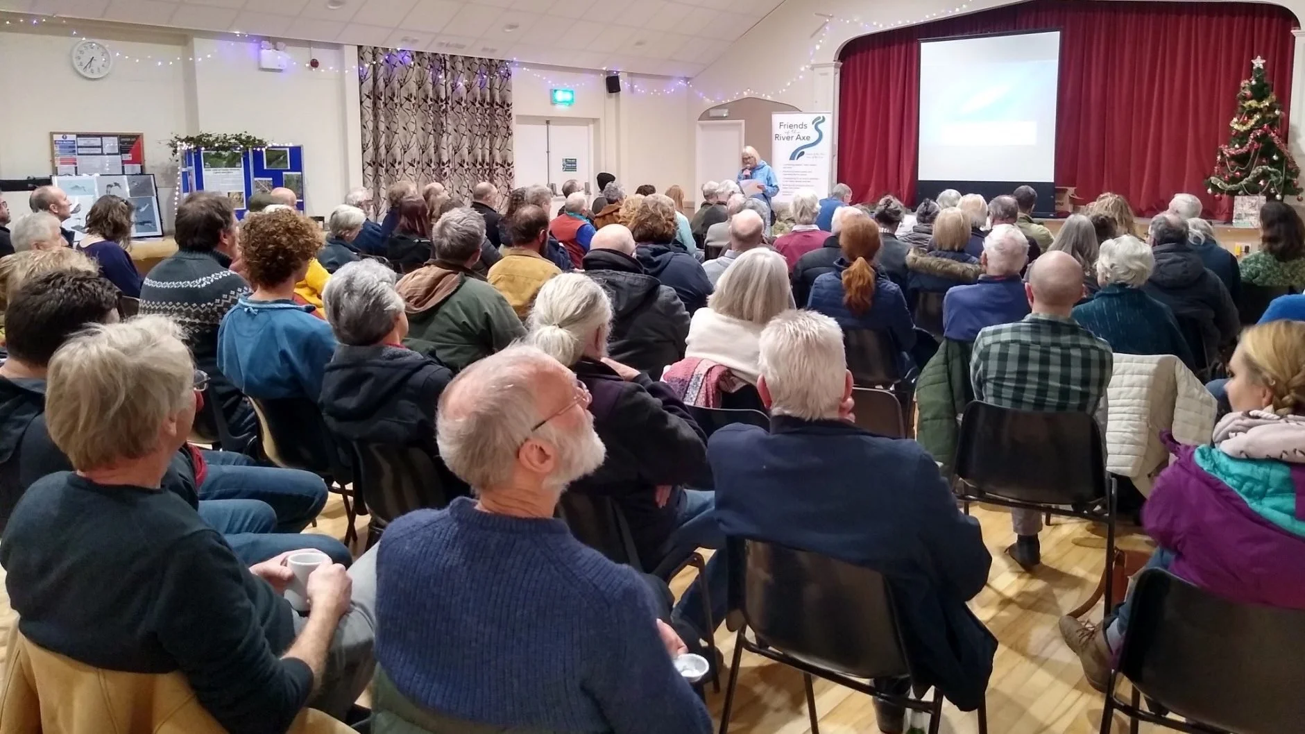 An indoor community event hosted by Friends of the River Axe